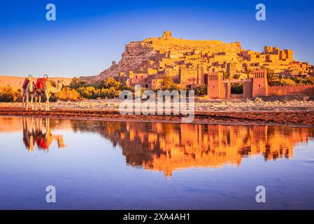 Ouarzazate, Morocco. Beautiful sunset with famous ksar of Ait-Benhaddou, clay and adobe architecture in North Africa, High Atlas mountains. Stock Photo