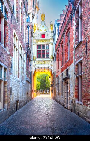 Bruges, Belgium. Blinde-Ezelstraat is the Blind Donkey Street and connects two major Brugge attractions the Burg Square and the Fish Market. Travel de Stock Photo