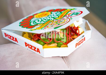 Czech republic, Prague - May 17, 2024: Box with sweet dessert Chupa Chups jelly pizza  Stock Photo