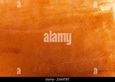 Orange leather texture background, useful as background. Orange matte suede fabric background, close-up. High quality photo Stock Photo
