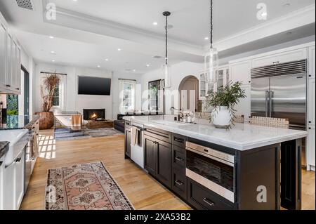 A bright kitchen with ample cabinets and countertops Stock Photo