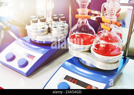 Laboratory heating blocks with interchangeable inserts for flasks Stock Photo