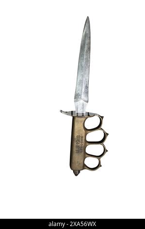 Detail of an old US - LF&C model M1 1918 American trench knife from the Second World War, the handle includes a brass knuckle. on white background Stock Photo