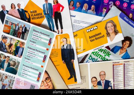 Parliament election campaign flyers / folders of different political parties’ representatives for the 2024 Belgian elections on 9 June 2024 in Belgium Stock Photo