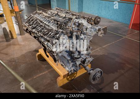 The remains of an old large V12 internal combustion engine from the Second World War, crashed and broken Stock Photo