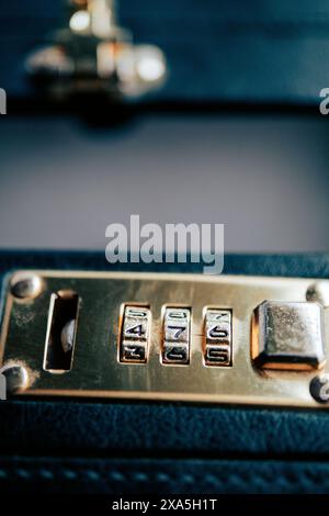 Detail of the open combination lock on a black briefcase Stock Photo