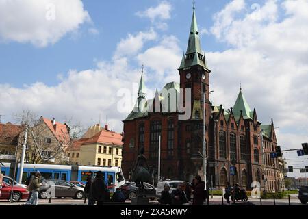 Colorful tram and university library building in the streets of Wroclaw, Poland Stock Photo