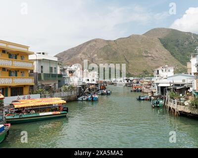 View of stilt houses build in the water in the historic Tai O fishing village on Lantau Island in Hong Kong Stock Photo