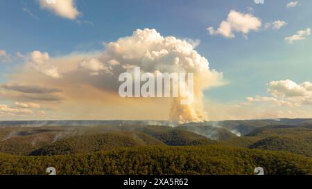 Drone aerial photograph of controlled bush fire hazard reduction burning by the Rural Fire Service in the Blue Mountains in NSW, Australia. Stock Photo