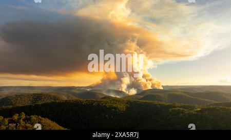 Drone aerial photograph of controlled bush fire hazard reduction burning by the Rural Fire Service in the Blue Mountains in NSW, Australia. Stock Photo