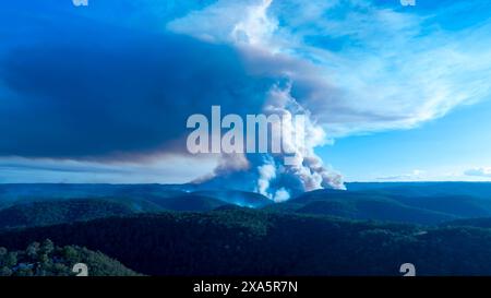 Drone aerial photograph of controlled bush fire hazard reduction burning by the Rural Fire Service in the Blue Mountains in NSW, Australia. Stock Photo