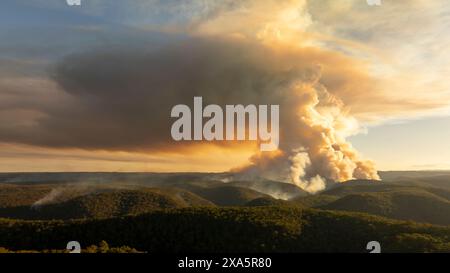 Drone aerial photograph of controlled bush fire hazard reduction burning by the Rural Fire Service in the Blue Mountains in NSW, Australia. Stock Photo