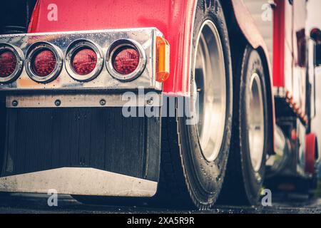 A closeup shot of the rear lights of a red semi-truck Stock Photo