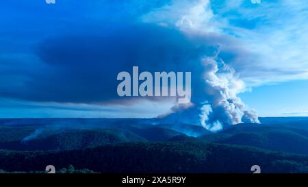 Drone aerial photograph of controlled bush fire hazard reduction burning by the Rural Fire Service in the Blue Mountains in NSW, Australia. Stock Photo