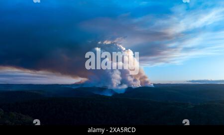 Drone aerial photograph of controlled bush fire hazard reduction burning by the Rural Fire Service in the Blue Mountains in NSW, Australia. Stock Photo