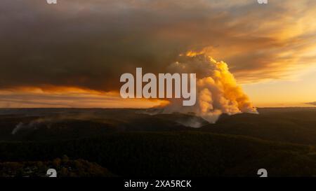 Drone aerial photograph of controlled bush fire hazard reduction burning by the Rural Fire Service in the Blue Mountains in NSW, Australia. Stock Photo