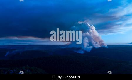 Drone aerial photograph of controlled bush fire hazard reduction burning by the Rural Fire Service in the Blue Mountains in NSW, Australia. Stock Photo