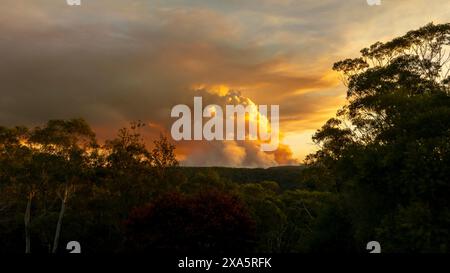 Drone aerial photograph of controlled bush fire hazard reduction burning by the Rural Fire Service in the Blue Mountains in NSW, Australia. Stock Photo