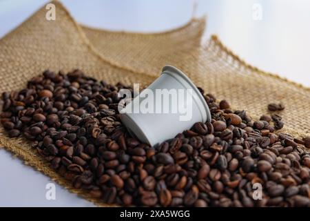 Coffee beans in a can with burlock jute Stock Photo