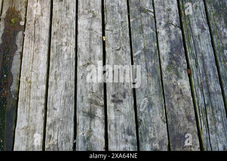 An outdoor patio made of stacked old wooden planks Stock Photo