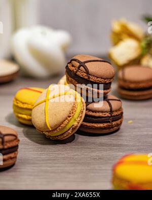 The Colorful macarons and assorted sweets displayed on a table Stock Photo