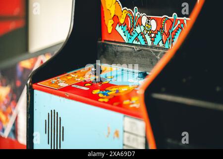 Vintage video game console on display in a museum with front panel visible Stock Photo