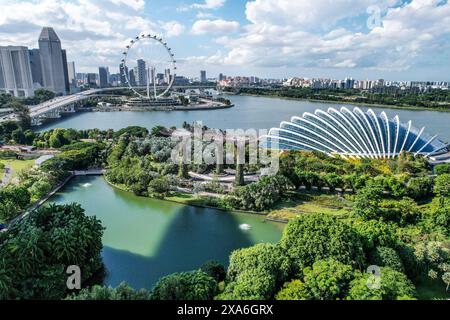 Aerial View of the Marina Bay, Gardens by the Bay, Biodome and Singapore Flyer in the distance, Singapore City Stock Photo