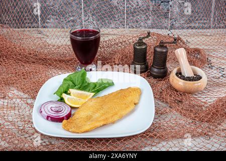 Fried salmon with corn tortillas flavored with cornmeal. Pieces of fried fish coated in cornmeal. Salmon fillet cooked in cornmeal. Stock Photo
