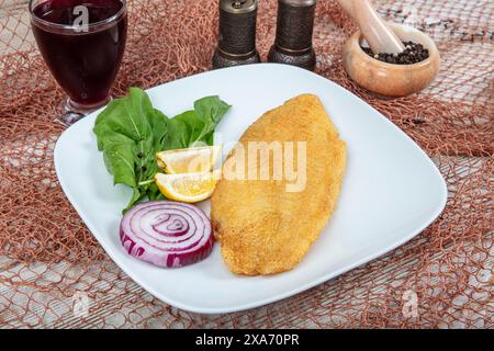 Fried salmon with corn tortillas flavored with cornmeal. Pieces of fried fish coated in cornmeal. Salmon fillet cooked in cornmeal. Stock Photo