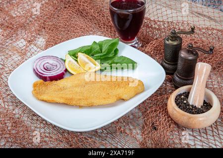 Fried salmon with corn tortillas flavored with cornmeal. Pieces of fried fish coated in cornmeal. Salmon fillet cooked in cornmeal. Stock Photo