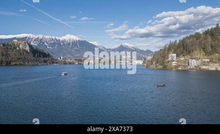 View over Lake Bled to the castle and the snowy mountains behind in Bled, Slovenia, Europe. Stock Photo