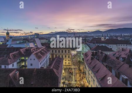 View from the Schlossberg to a Christmas market in the old town of Graz, Styria, Austria. Stock Photo