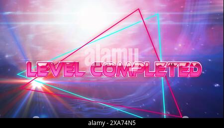 Image of level completed text in metallic letters on pink and blue triangles and universe Stock Photo