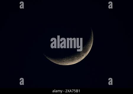 Detailed close-up of crescent moon against night sky Stock Photo