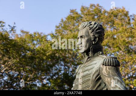 Jackson, Mississippi, USA - April 23, 2024: Afternoon light shines on a historic statue of President Andrew Jackson outside of City Hall. Stock Photo