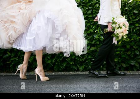 A newlywed couple on the path Stock Photo
