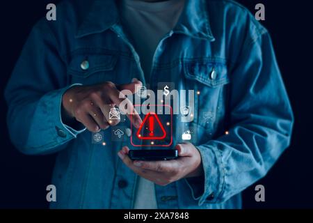 System warning hacked alert, cyber attack on computer network. programmer, Businessman staff, developer using technology with triangle caution warning Stock Photo