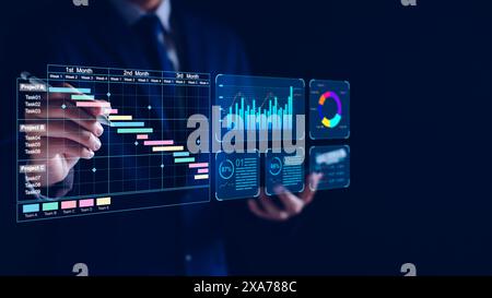 Data analyst working on business analytics dashboard with charts, metrics and KPI to analyze performance and create insight reports and strategic deci Stock Photo