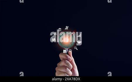 Target, Goal, strategies for success, Businessman using magnifying glass focusing on target goal icon, corporate development, global business leadersh Stock Photo
