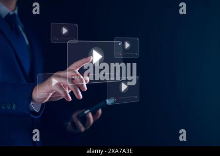 watch online streaming video. Man searching video content on internet, to watch online entertainment streaming, online learning, watch video and live Stock Photo