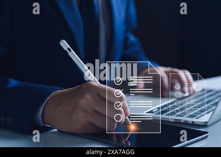Businessman working with tablet. Checking mark up on the check boxes. Successful completion of business tasks. Digital marketing of statistics level u Stock Photo