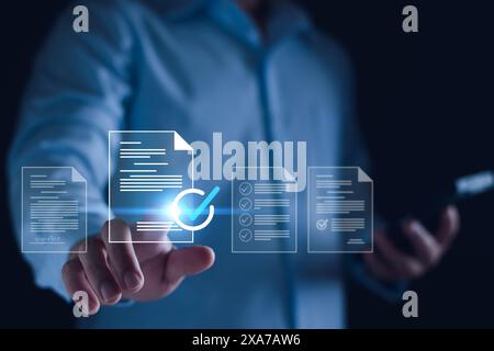 Manager is verifying the validity, security, approving requests, quality assurance, investment contracts. Online digital document work, paperless offi Stock Photo