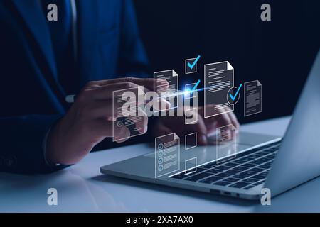 Manager is verifying the validity, security, approving requests, quality assurance, investment contracts. Online digital document work, paperless offi Stock Photo