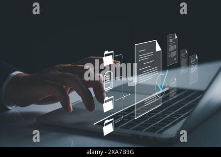 Online survey filling out, digital form checklist by laptop computer, Document Management Checking System, online documentation database and process m Stock Photo