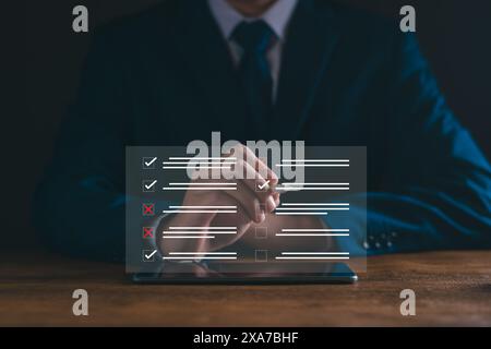 Check list concept. Businessman tick off questionnaire, survey, test, checklist, business question, approve check. Digital checklist option. Paperless Stock Photo