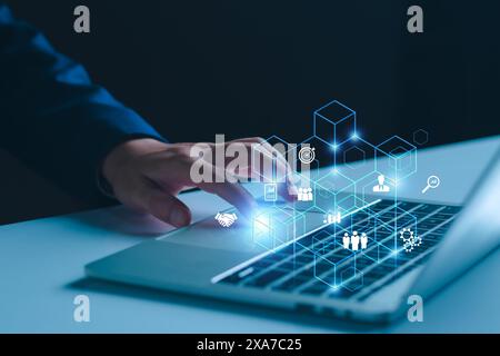 Blockchain technology transaction concept. Businessman use laptop on blockchain global networking, data network connect, Internet cyber security binar Stock Photo
