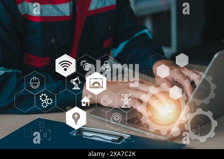 Engineering services concept. Electrical engineer use computer laptop checking and analysis data of power plant station project, internet system netwo Stock Photo