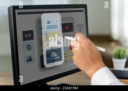 Creative web content design studio with flying website page layout seo technology businessman hand design on laptop designs for mobile app Stock Photo