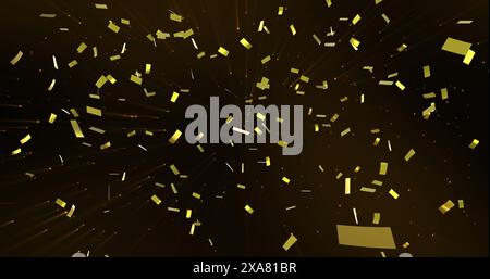 Image of confetti falling over black background Stock Photo