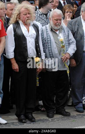 The scene in Wootton Bassett, Wiltshire today as the bodies of five service men killed in Afghanistan are repatriated to the UK. Crowds of family members, friends and members of the public lined the streets to pay their respects to the fallen on their return to the UK. 10/7/2009 Stock Photo